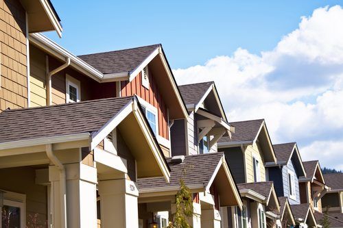 A row of new townhouses or condominiums.