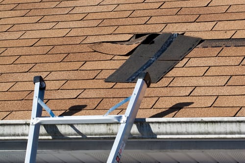 Fixing damaged roof shingles